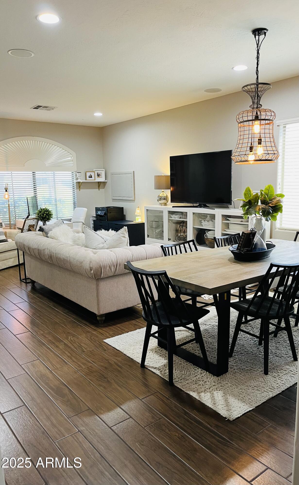 11411 East Sebring Circle Mesa, AZ 85212 - Photo 67 of 87 a view of a livingroom with furniture window and wooden floor