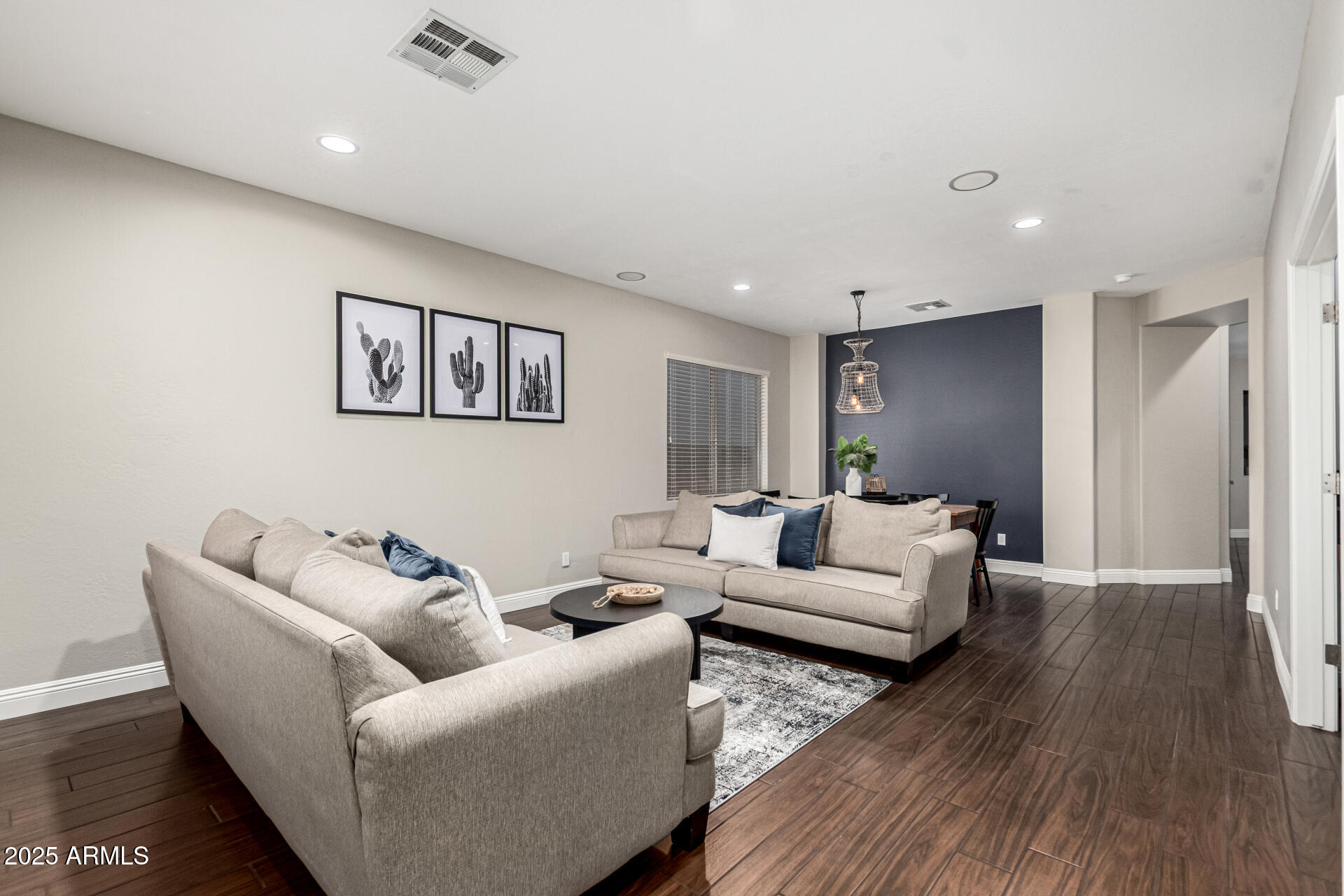 11411 East Sebring Circle Mesa, AZ 85212 - Photo 7 of 87 a living room with furniture and wooden floor