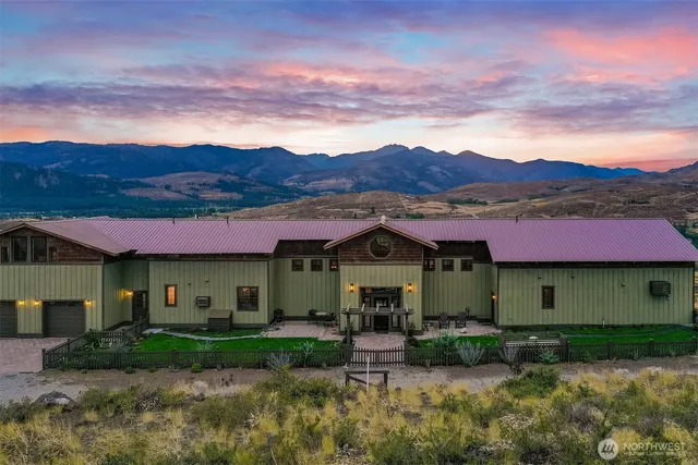 a view of kitchen with stainless steel appliances kitchen island a refrigerator and a stove