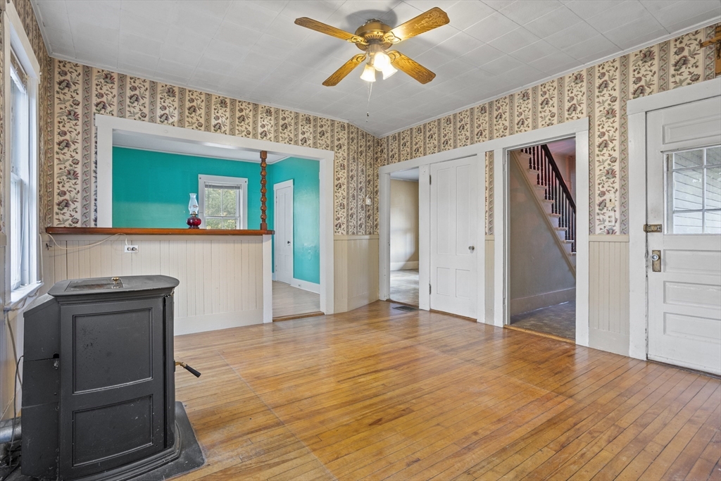 2 Maple Street Shirley, MA 01464 - Photo 12 of 35 wooden floor in an empty room with a window
