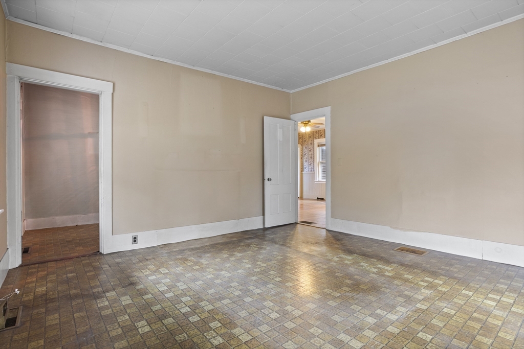 2 Maple Street Shirley, MA 01464 - Photo 14 of 35 an empty room with an entryway door
