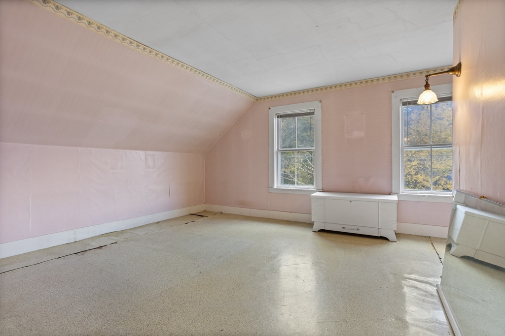 2 Maple Street Shirley, MA 01464 - Photo 22 of 35 a view of an empty room with a window