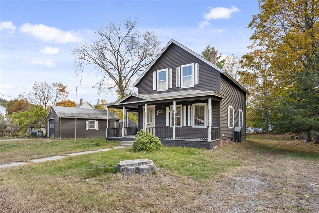 2 Maple Street Shirley, MA 01464 - Photo 29 of 35 a front view of a house with garden