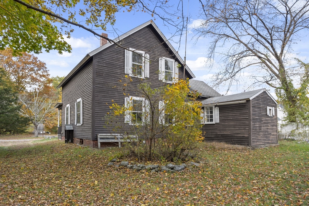 2 Maple Street Shirley, MA 01464 - Photo 31 of 35 a view of a house with a yard