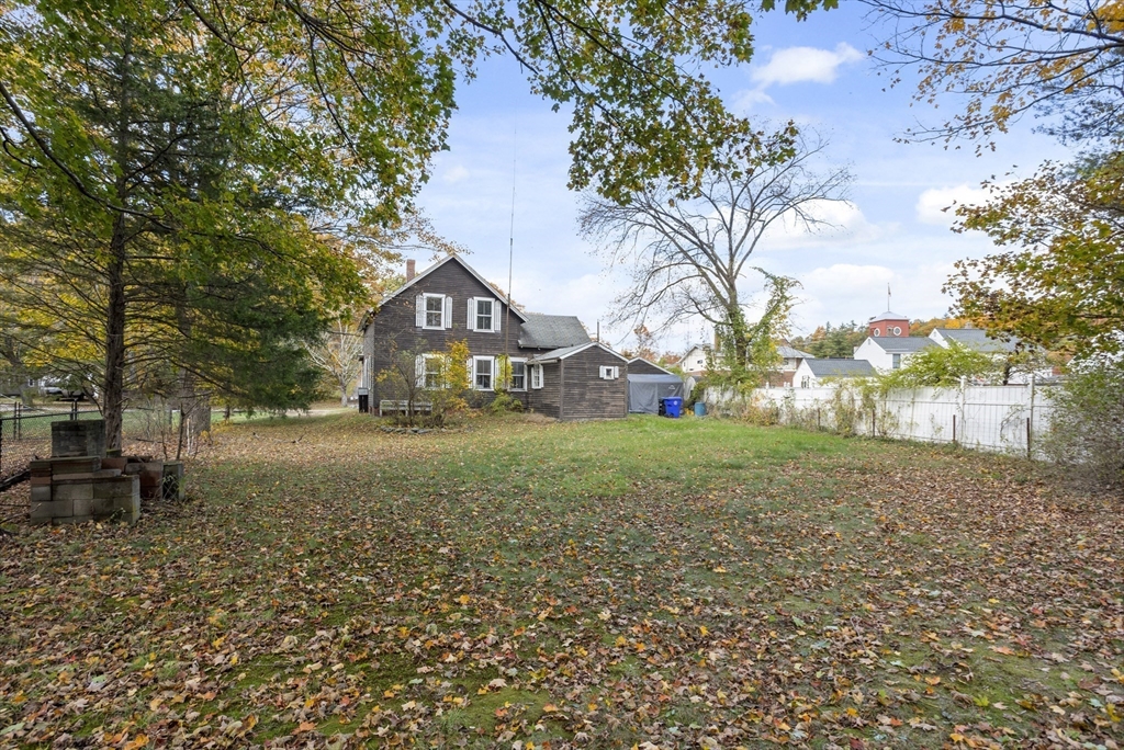 2 Maple Street Shirley, MA 01464 - Photo 9 of 35 a view of house with yard