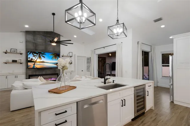 a bathroom with a toilet sink and shower
