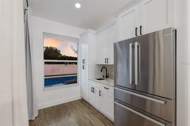 a bedroom with bed and a window