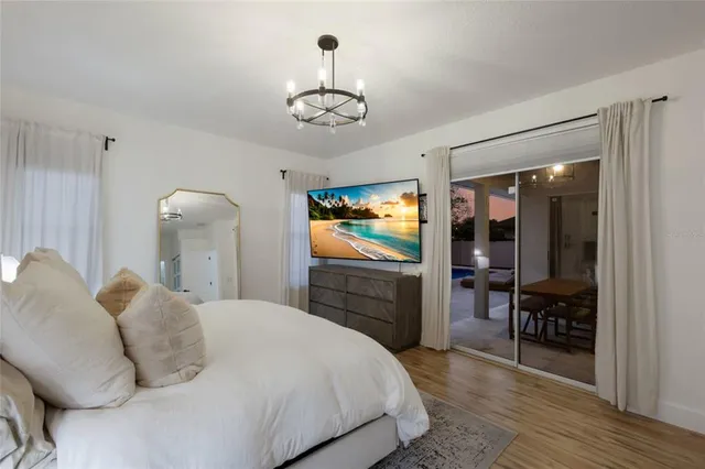 an aerial view of a house with garden space and street view