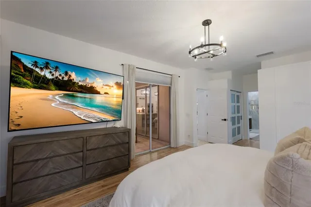 an aerial view of residential houses with city view