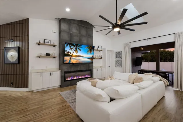 a kitchen with stainless steel appliances kitchen island granite countertop a sink and cabinets