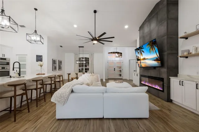 a kitchen with sink and stove