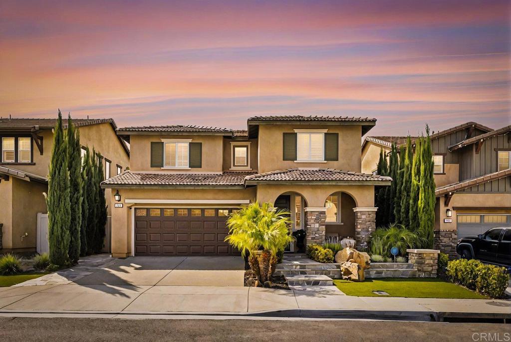 a front view of house with yard