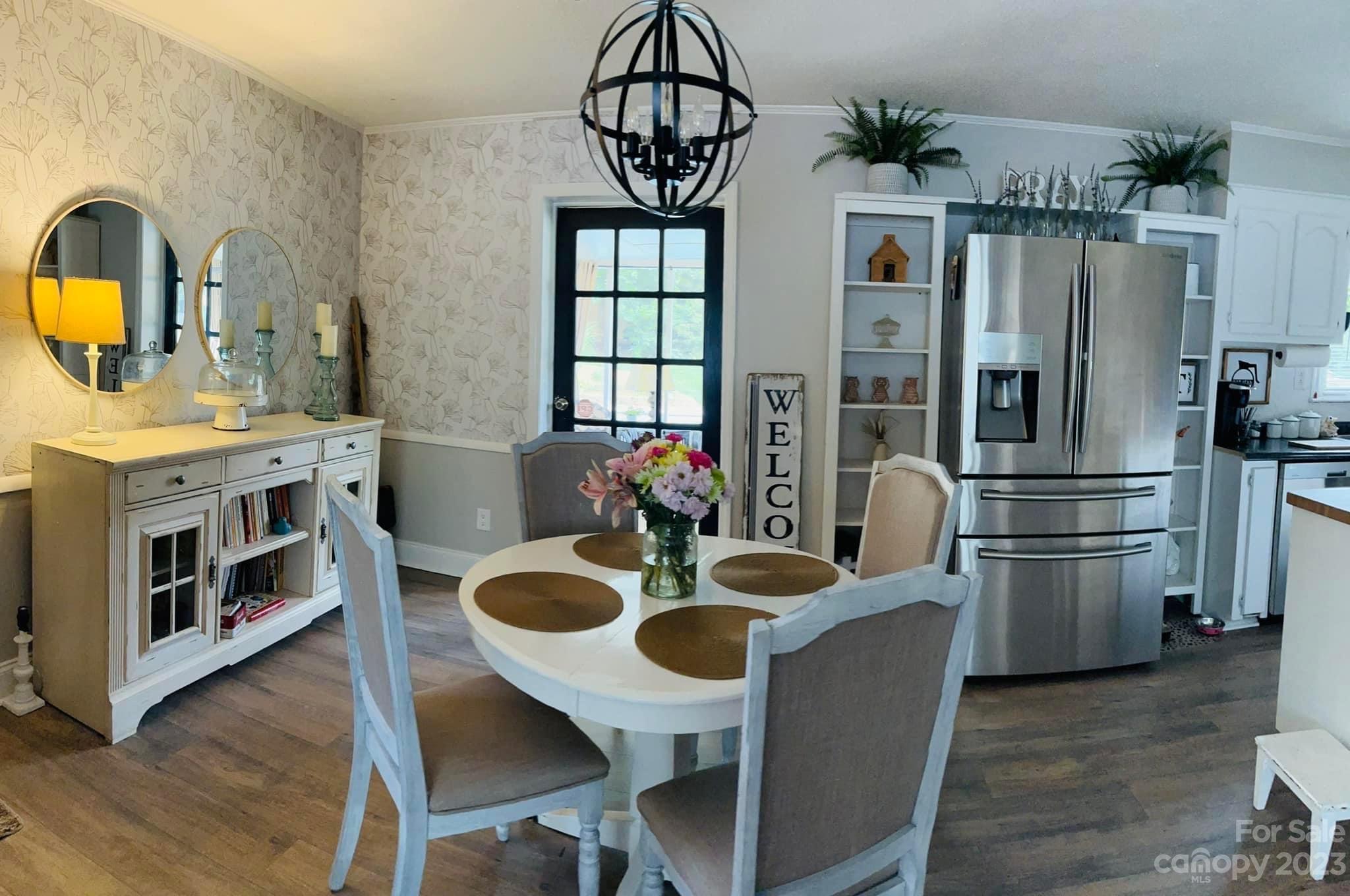 3001 Beaty Road Gastonia, NC 28056 - Photo 14 of 15 a view of a dining room with furniture window and wooden floor