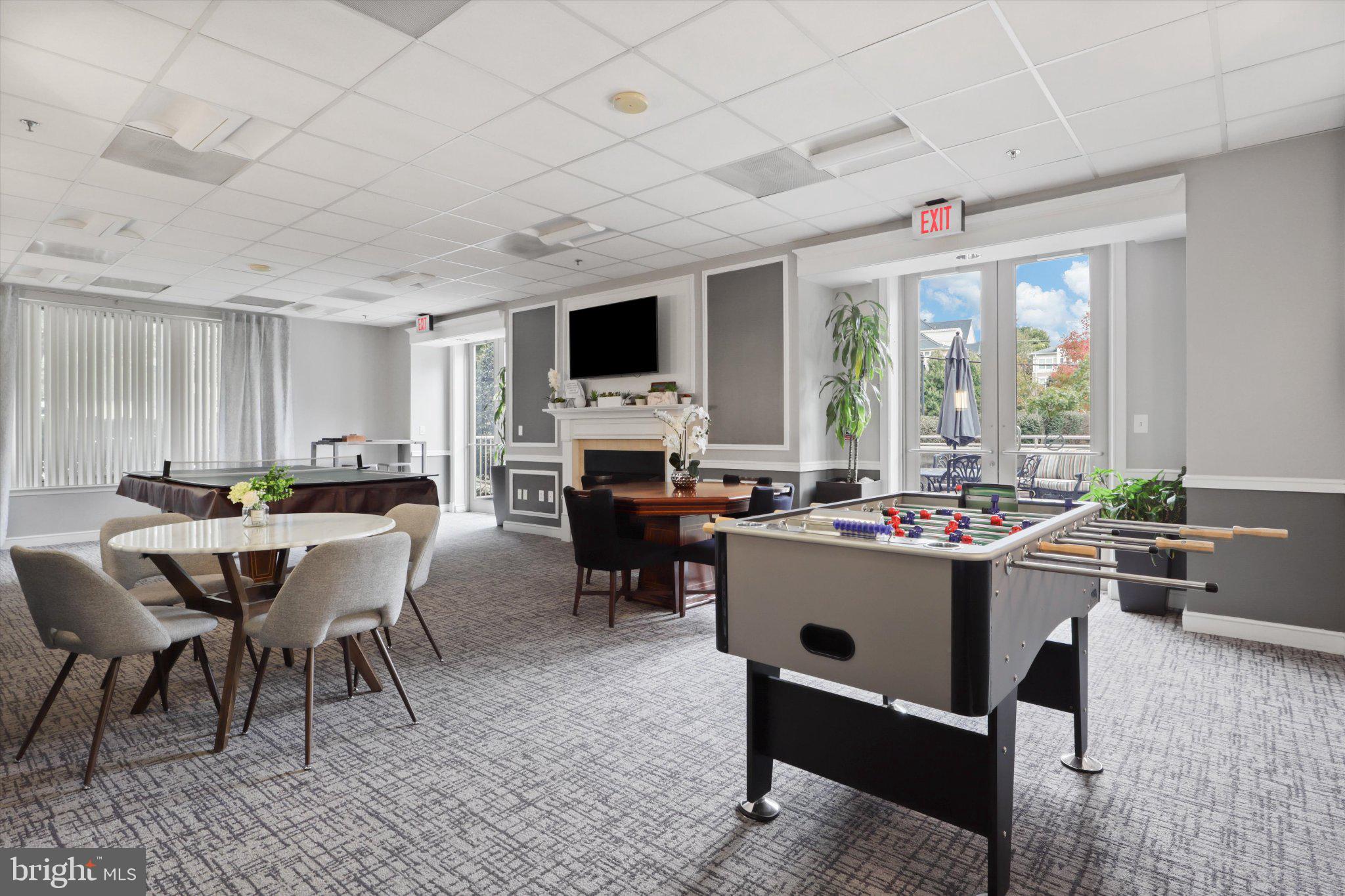 2726 Gallows Road, Unit 1506 Vienna, VA 22180 - Photo 25 of 35 Modern lounge with game amenities.