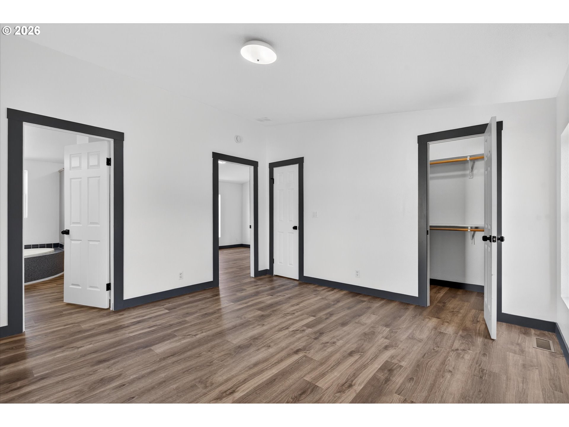 208 16th Street La Grande, OR 97850 - Photo 19 of 42 a view of an empty room and wooden floor