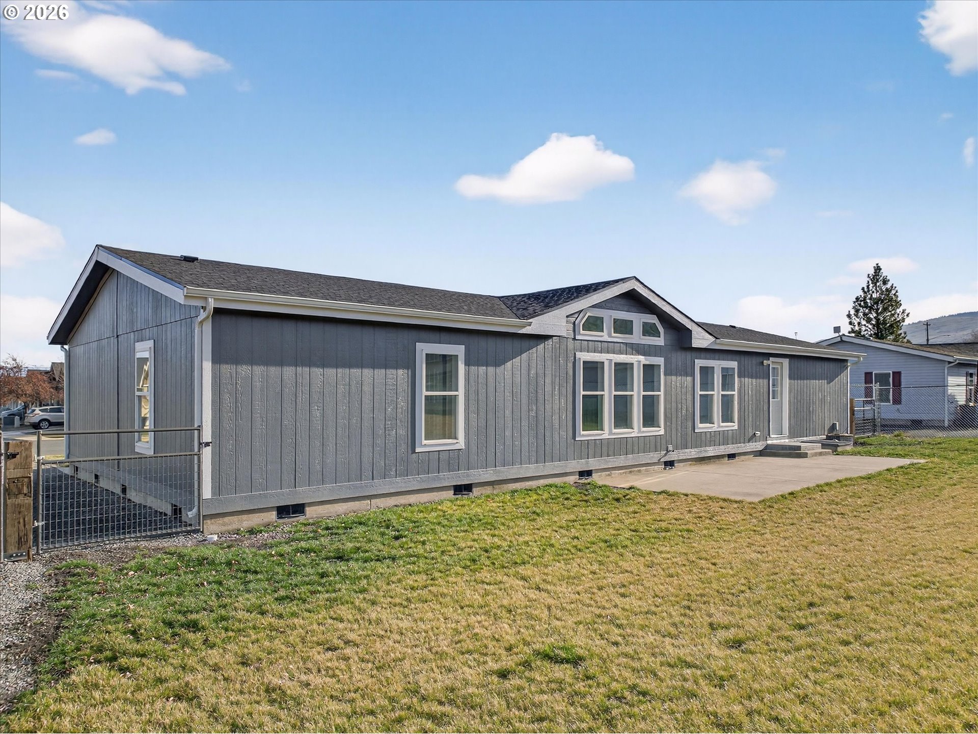 208 16th Street La Grande, OR 97850 - Photo 34 of 42 a front view of a house with a yard