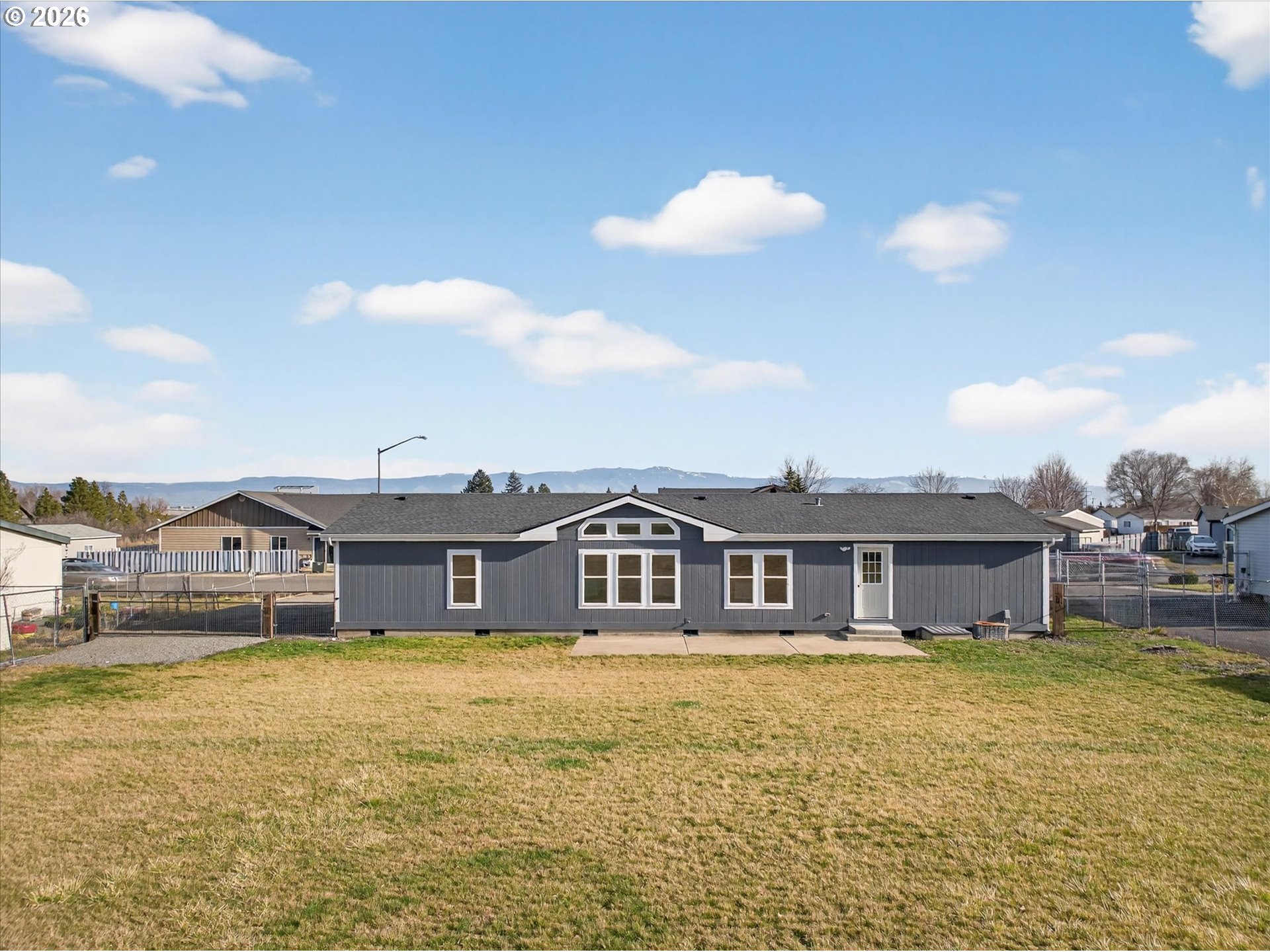 208 16th Street La Grande, OR 97850 - Photo 36 of 42 a swimming pool view with a lake view