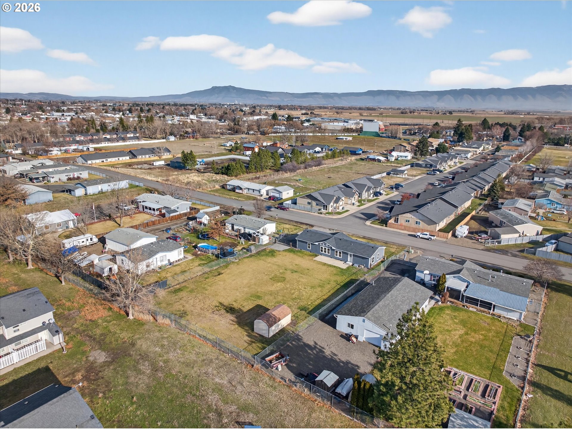 208 16th Street La Grande, OR 97850 - Photo 41 of 42 an aerial view of residential houses with outdoor space