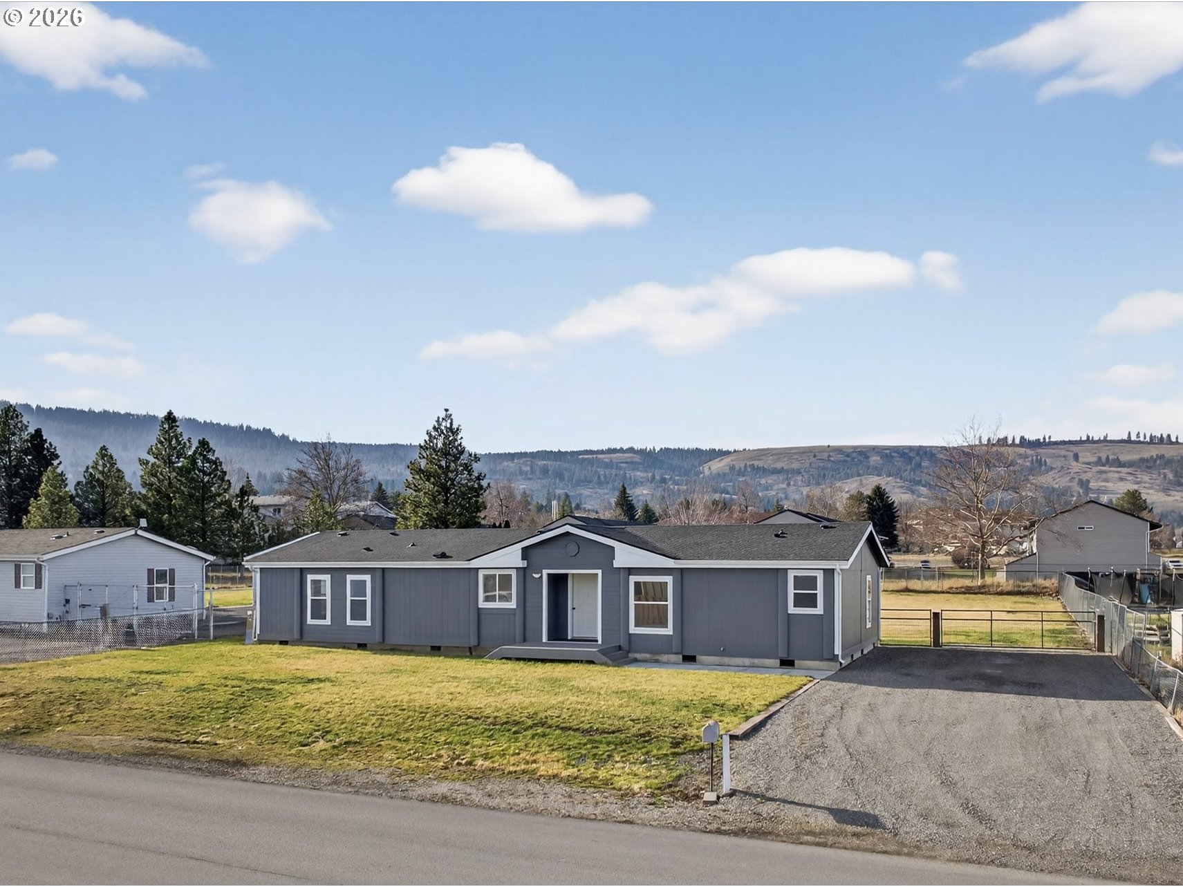 208 16th Street La Grande, OR 97850 - Photo 5 of 42 an aerial view of a house
