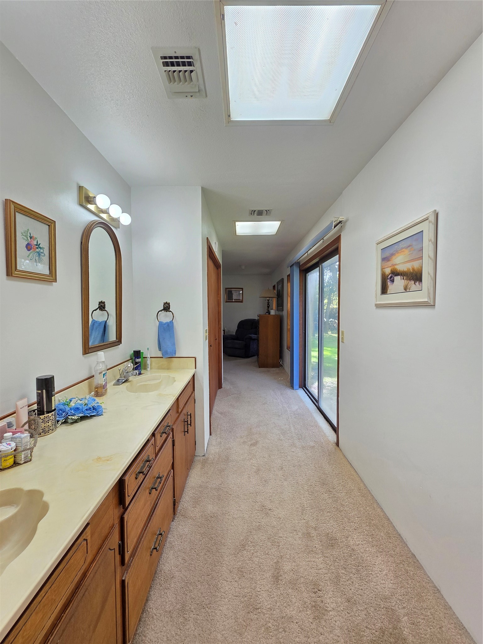 406 Wilson Creek Road Palacios, TX 77465 - Photo 28 of 49 a spacious bathroom with a granite countertop sink a mirror and a shower