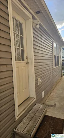 a view of a back yard of the house