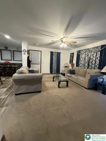 a bed room with closet and flat tv screen