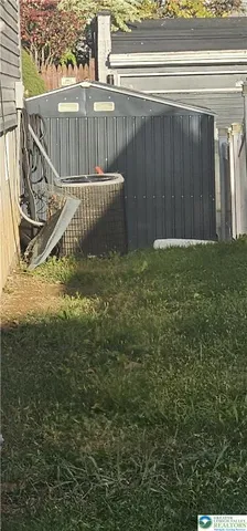 a view of outdoor space with deck and yard