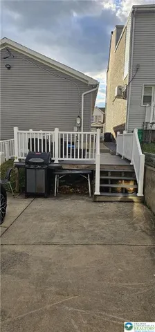 a view of a balcony with chairs