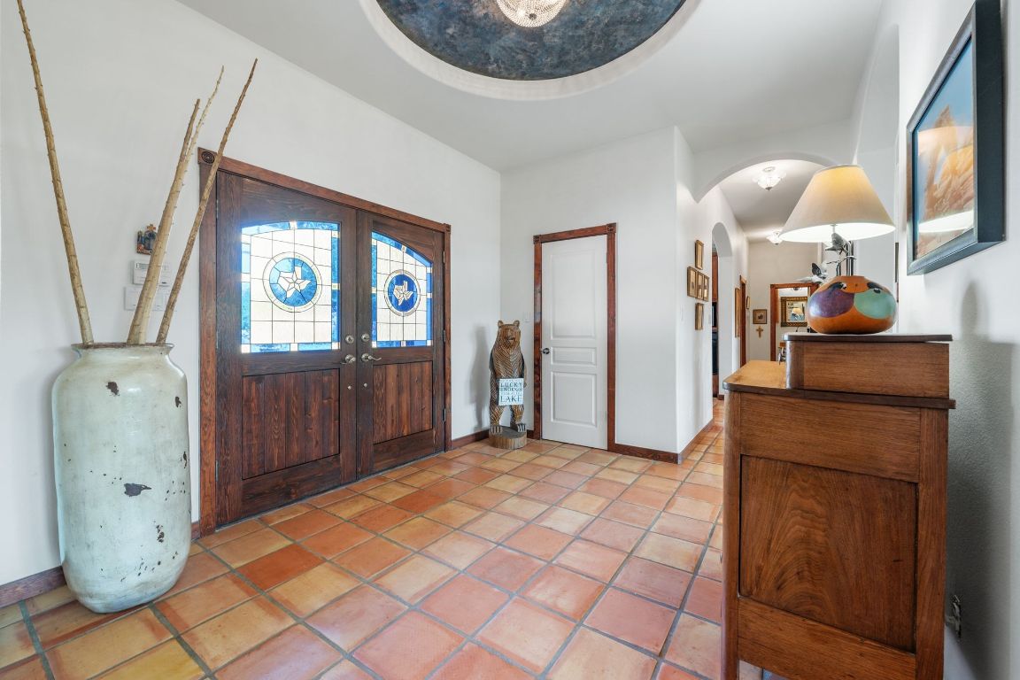 16312 Lake Loop Austin, TX 78734 - Photo 11 of 36 a view of a hallway with elevator
