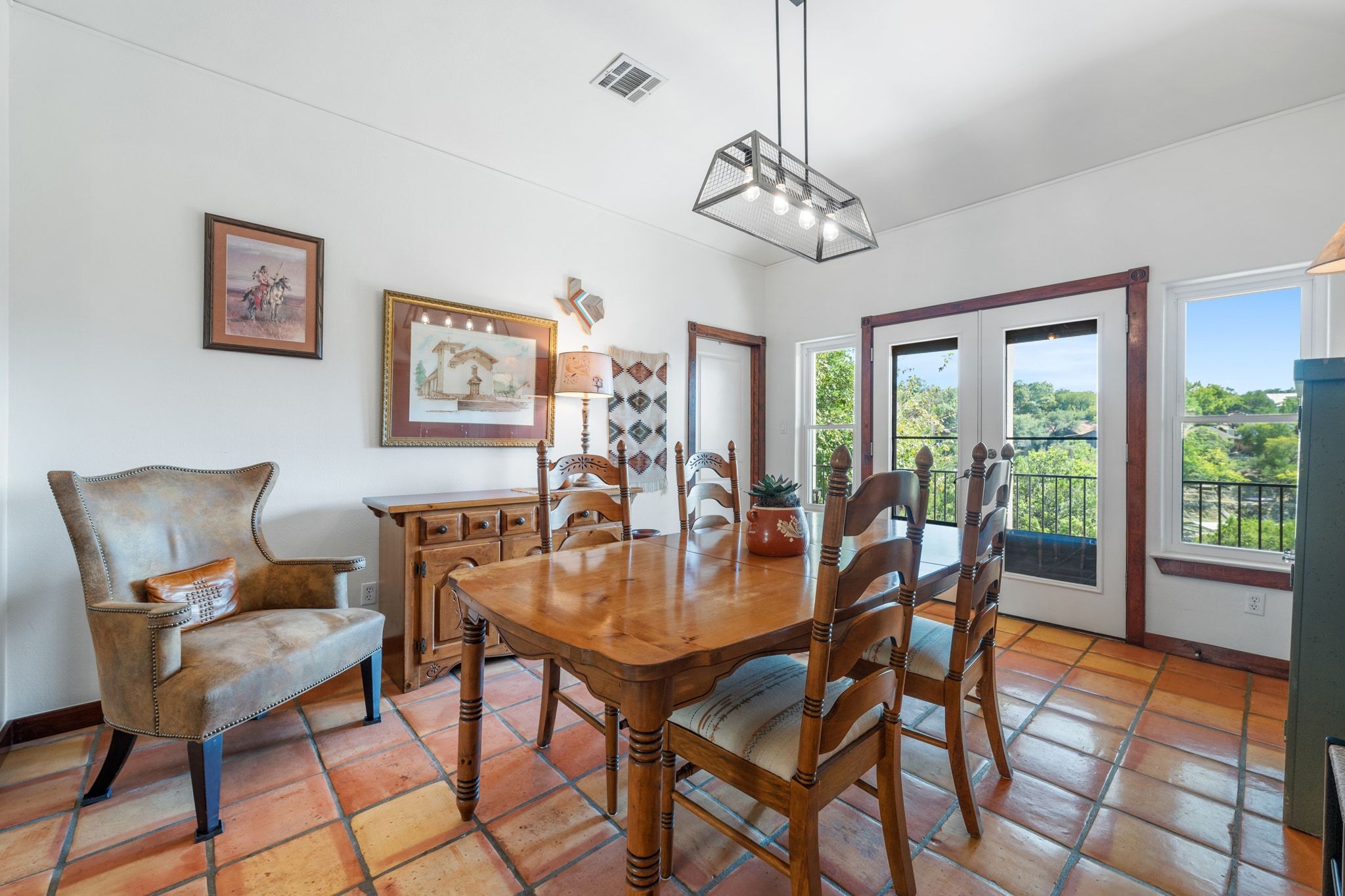 16312 Lake Loop Austin, TX 78734 - Photo 17 of 36 a view of a dining room with furniture window and outside view