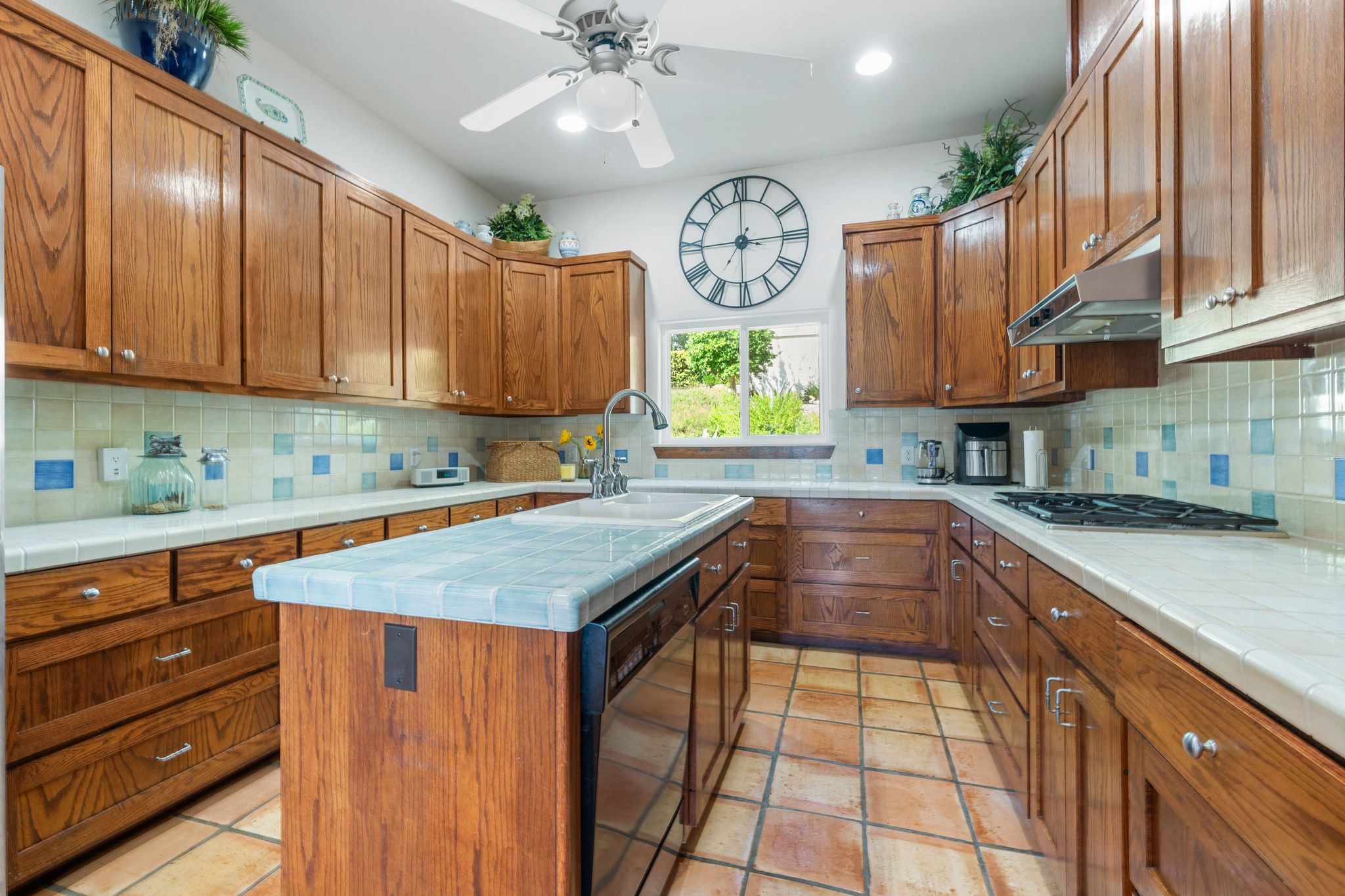 16312 Lake Loop Austin, TX 78734 - Photo 18 of 36 a kitchen with a cabinets and window