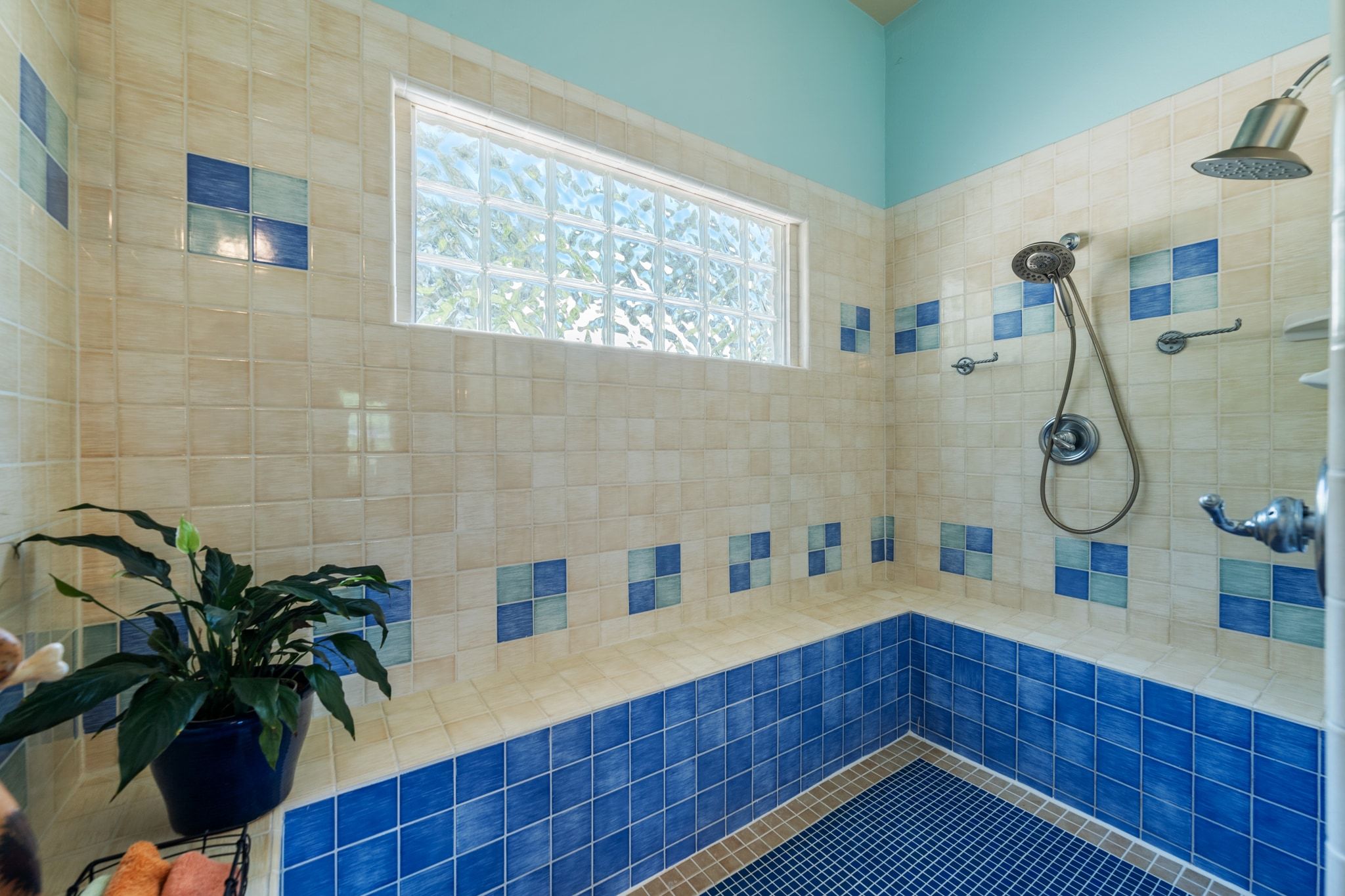 16312 Lake Loop Austin, TX 78734 - Photo 24 of 36 a kitchen with a wooden floor and a potted plant