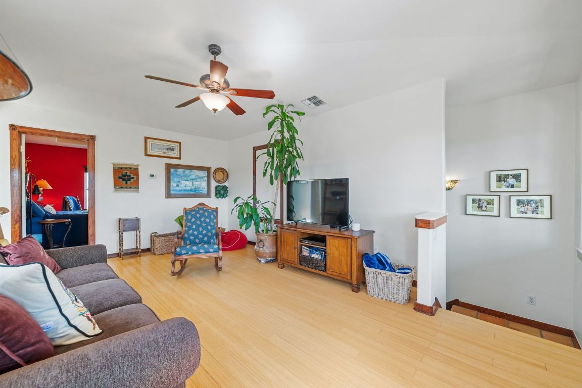 16312 Lake Loop Austin, TX 78734 - Photo 28 of 36 a living room with furniture and a flat screen tv