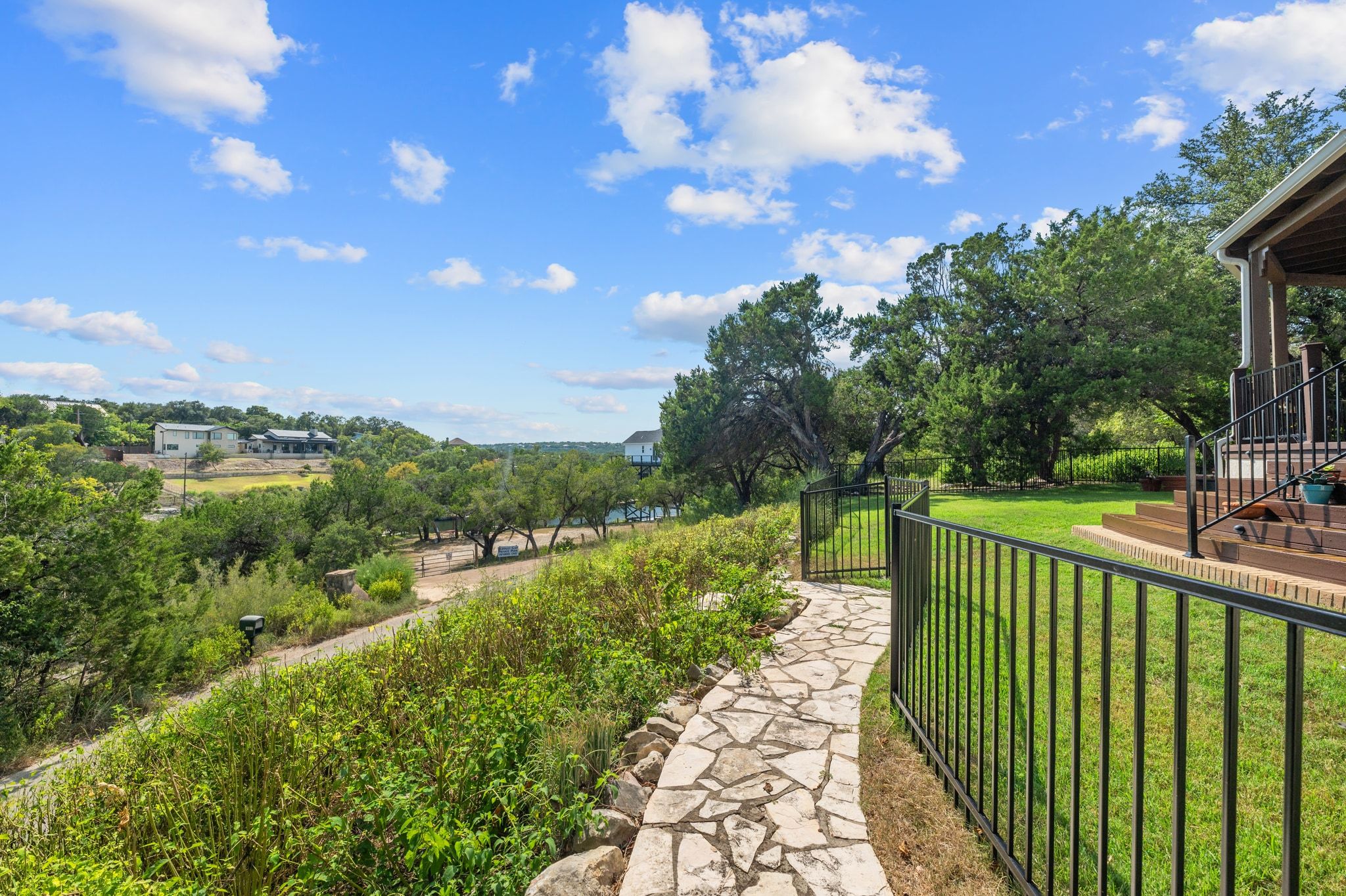 16312 Lake Loop Austin, TX 78734 - Photo 36 of 36 a view of a pathway with a garden