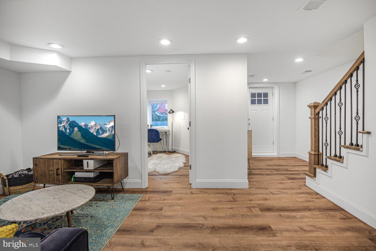 110 Seaton Place Northwest Washington, DC 20001 - Photo 25 of 47 a living room with furniture and a flat screen tv