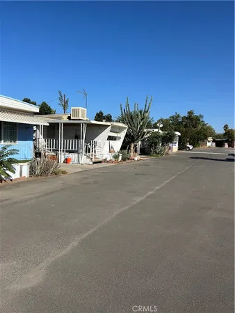 a view of a street with cars