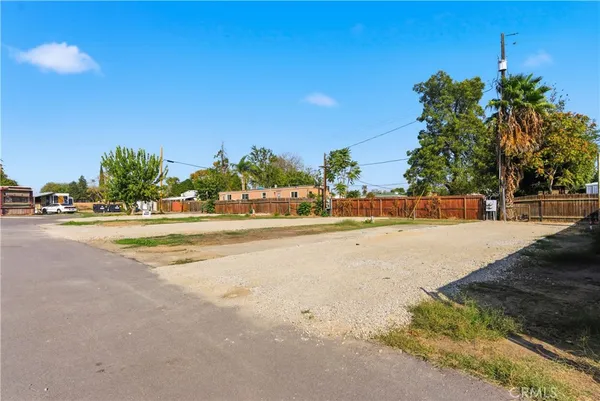 a view of road with houses