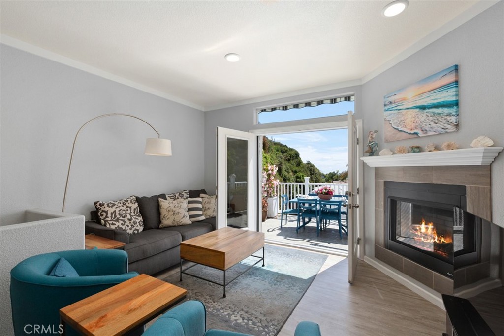 30802 South Coast Highway, Unit K14 Laguna Beach, CA 92651 - Photo 24 of 45 Fireplace in living room.