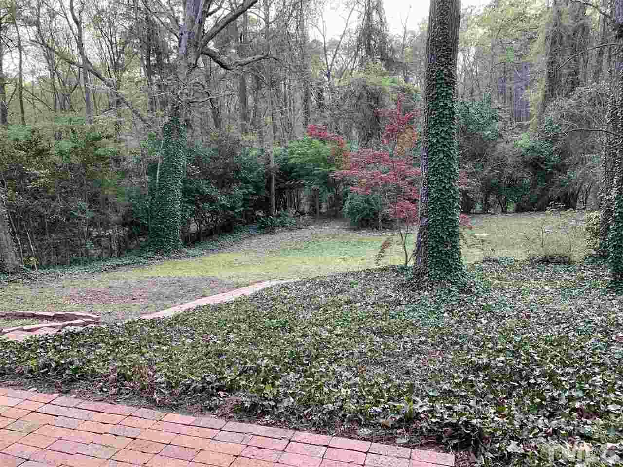 4931 Oak Park Road Raleigh, NC 27612 - Photo 10 of 10 a view of backyard with green space