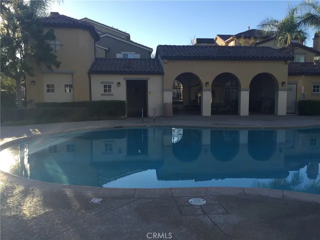 a view of a house with a street