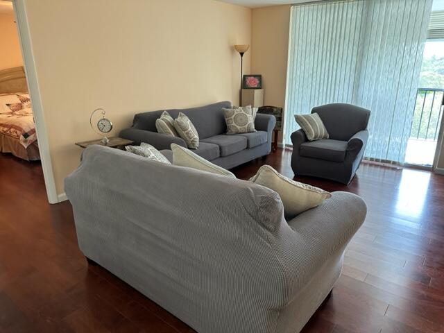 6500 Northwest 2nd Avenue, Unit 512 Boca Raton, FL 33487 - Photo 14 of 41 a living room with furniture and a couch