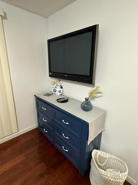 6500 Northwest 2nd Avenue, Unit 512 Boca Raton, FL 33487 - Photo 27 of 41 a living room with a flat screen tv and a toilet