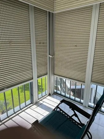 a view of swimming pool from a yard