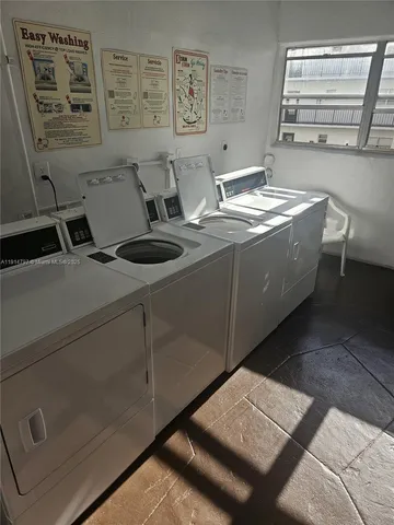 a view of balcony with furniture