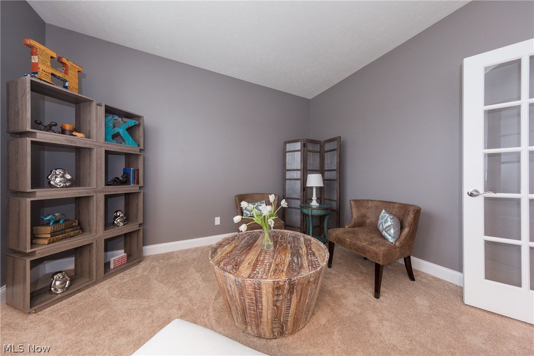 French doors welcome you to the den.  Great space for a first floor office/playroom.
