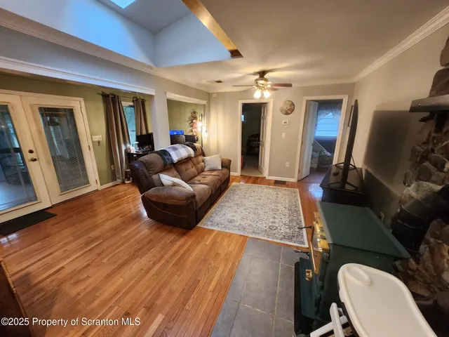 a kitchen with stainless steel appliances a refrigerator and a stove