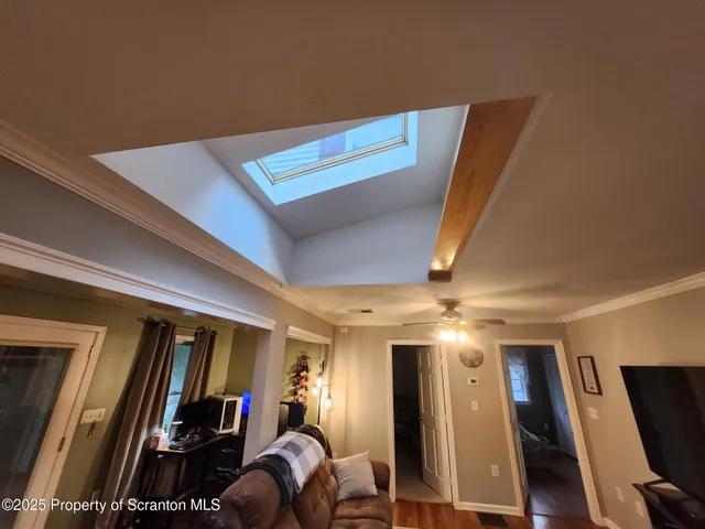 a kitchen with kitchen island granite countertop a sink and a stove