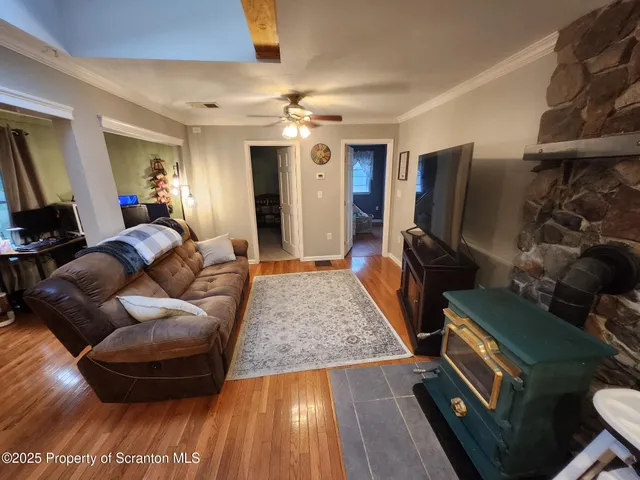 a kitchen with stainless steel appliances a sink stove and refrigerator