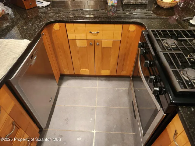 a bathroom with a sink and a shower