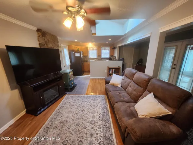 a room with gym equipment and a rug